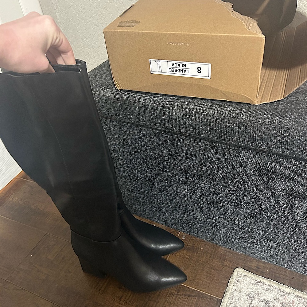 Brand new never been worn black knee high boots from DSW